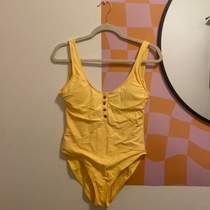 Yellow one piece swim suit
